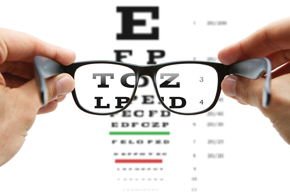 Eye Chart and a Pair of Glasses